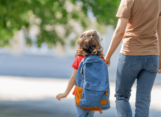 mother walking her child to school