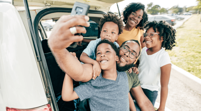 5 Tips for Summertime Travel in Texas Family taking selfie before leaving for summertime travel in Texas
