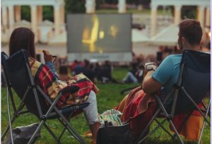 couple watching outdoor movie in Houston 