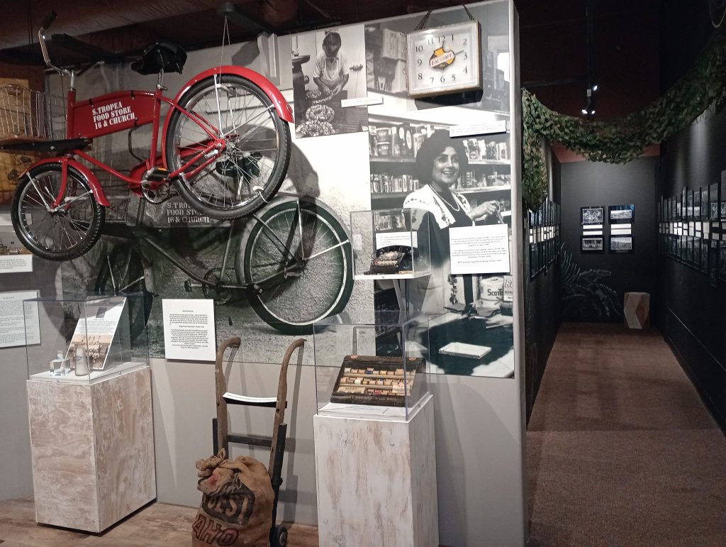 An exhibit, including a delivery bicycle, at the Galveston County Museum