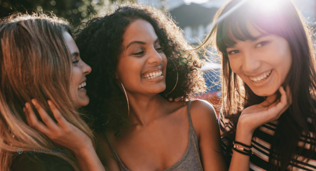 close friends smiling and laughing together