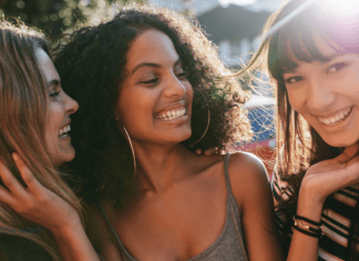 Yes, You Can Make (and Keep) Close Friends as an Adult close friends smiling and laughing together
