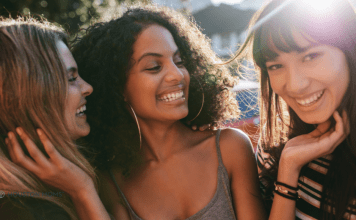 Yes, You Can Make (and Keep) Close Friends as an Adult close friends smiling and laughing together