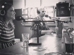 man and woman at microphones