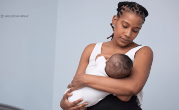 woman breastfeeding infant