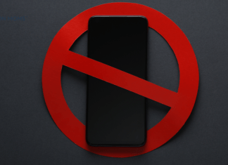 cell phone with ban symbol over it