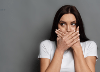 The Consequences of Pregnancy: How (Not) to Cuss Like a Sailor woman with hand over mouth