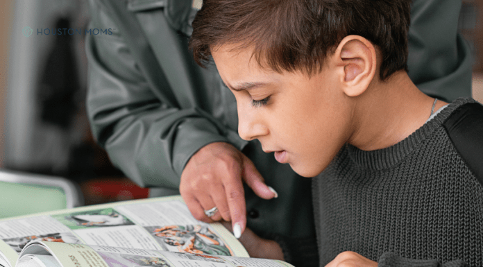 Let’s Talk Dyslexia: What Every Houston Mom Should Know child reading with woman pointing to words