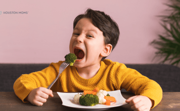 Easy Recipes to Get More Produce on Your Plate child eating a plate of vegetables
