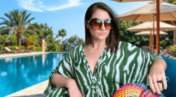 8 DIY Halloween Costumes for Grownups woman in caftan sits in front of resort pool