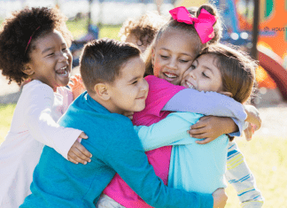 The Consequences of Pregnancy: Playdates and More kids in a group hug