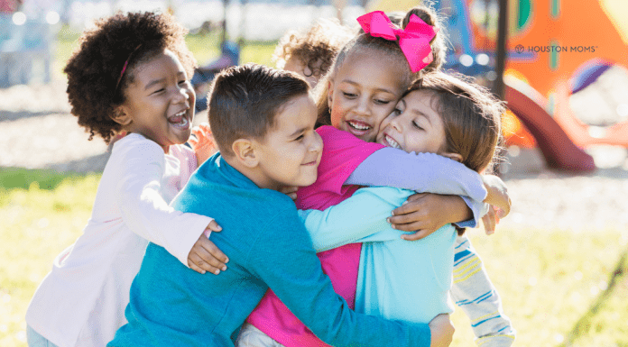 The Consequences of Pregnancy: Playdates and More kids in a group hug