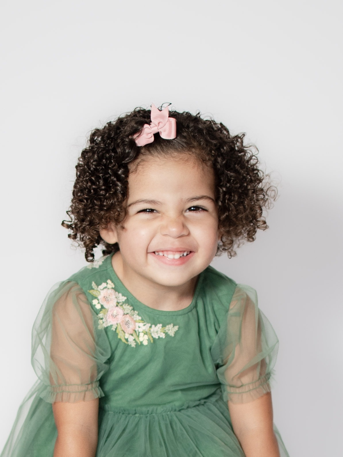 Toddler portrait by Danielle West Photography Smiling toddler portrait by Danielle West Photography