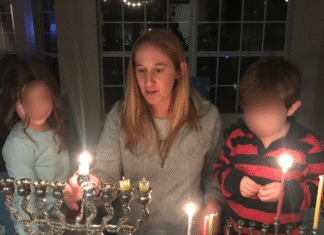 Eight Ways to Celebrate Hanukkah mother and children light a menorah