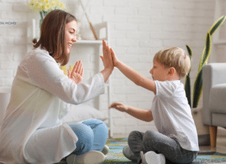 Background Checks: An Essential Step in Hiring a Nanny nanny with child playing on floor