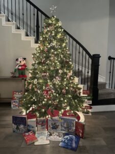Christmas tree surrounded by Christmas themed books