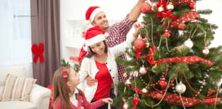 Type A Mom Decorates for the Holidays family decorating a tree