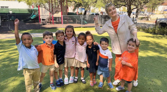 Crossing Borders: A Houston School that is Set Apart Teacher stands outside with preschool students