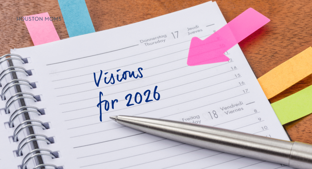 paper with "Visions for 2026" written on it.