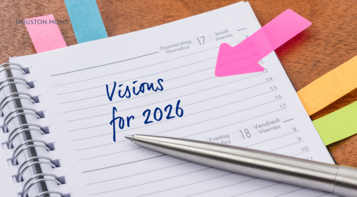 New Year’s Resolutions: How to Achieve Your Goals paper with "Visions for 2026" written on it.