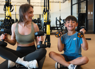 Discover Your Ideal Houston Wellness Experience mom and son lifting weights on floor of Villa Sport