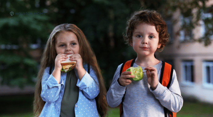 Food is Nourishment, Not Punishment girl eating sandwich and boy eating an apple