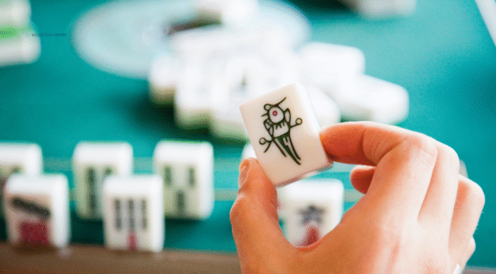 hand holding an American Mahjongg tile
