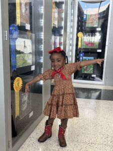 child in rodeo western dress