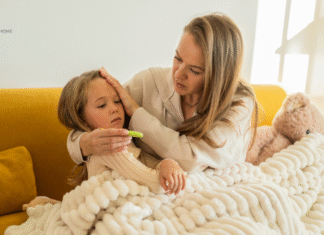 mother comforting sick child