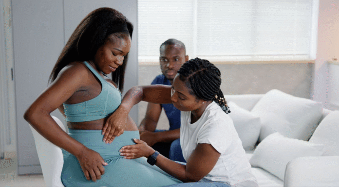 doula working with pregnant mom