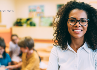 How to Show Your Child’s Teachers They are Appreciated teacher stands in front of students who are seated and working