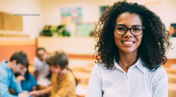 How to Show Your Child’s Teachers They are Appreciated teacher stands in front of students who are seated and working