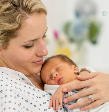 Becoming A Mother: A Reflection for Mother’s Day woman holds infant just born