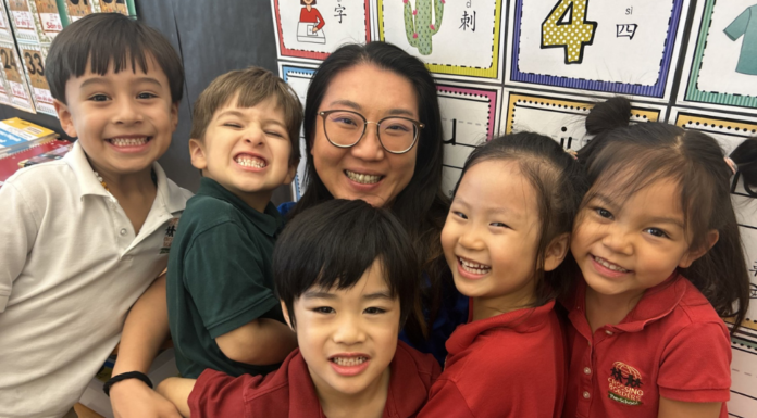 A Challenging Houston Preschool in a Nurturing, International Environment preschool teacher surrounded by her students