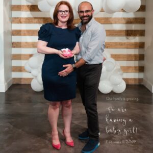 couple posing for mother's day picture