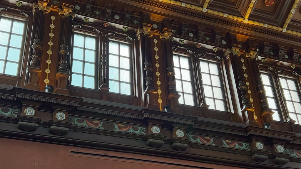 Decorative windows on the upper floor of the Julie Ideson Building