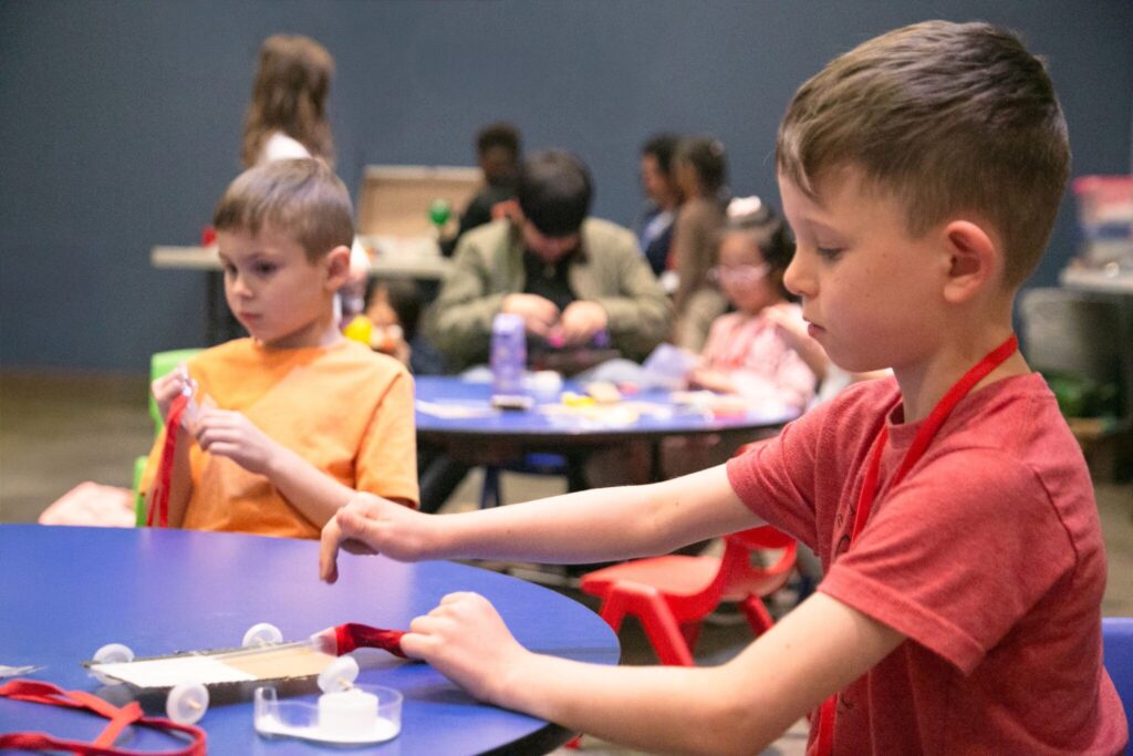 child works on project at The Health Museum