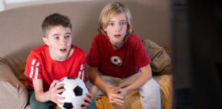 Soccer watch parties with two boys watching soccer
