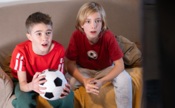 Soccer watch parties with two boys watching soccer