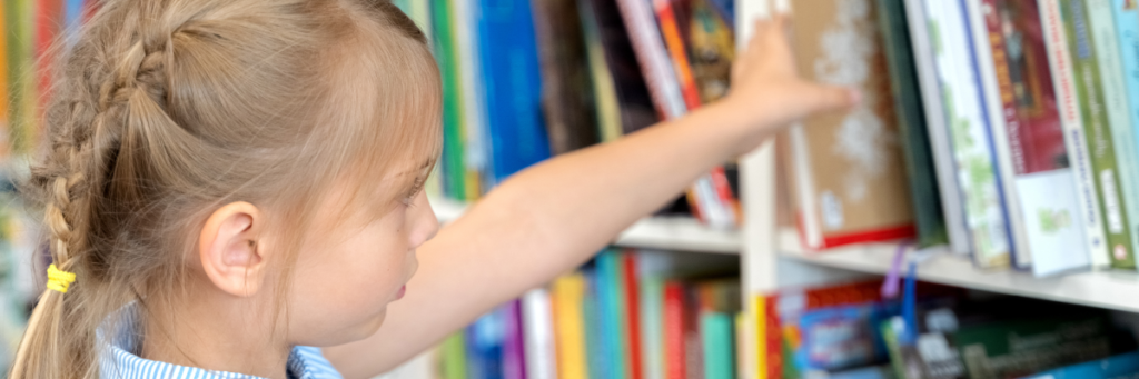 Stock image of girl in library