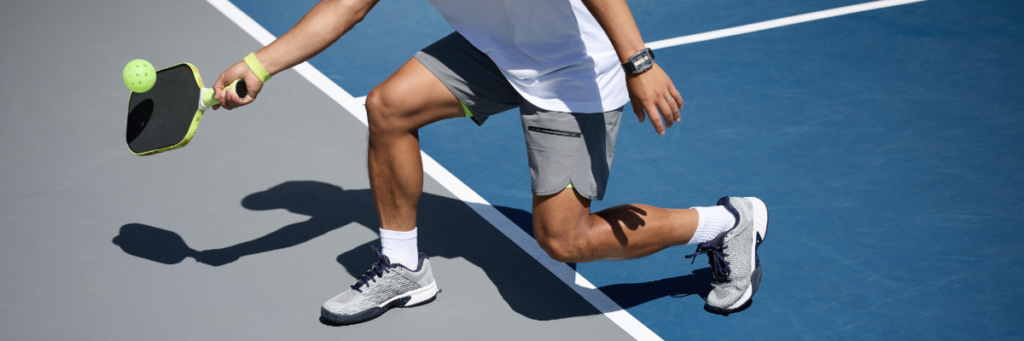 Stock image of a pickleball player